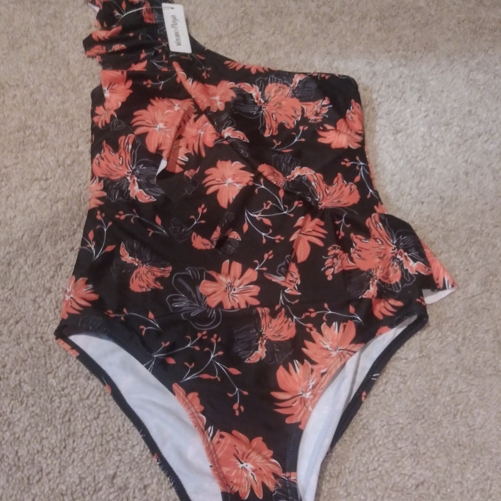 Adorable, new with tags one piece swimsuit.
